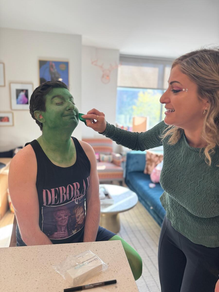 Sam Gold applies Nick Rizzo's makeup for their soon-to-be viral, Wicked good time. 