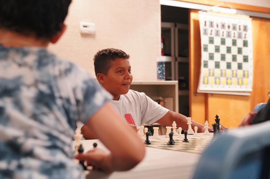 Students learning new openings and checkmate patterns in Chess.