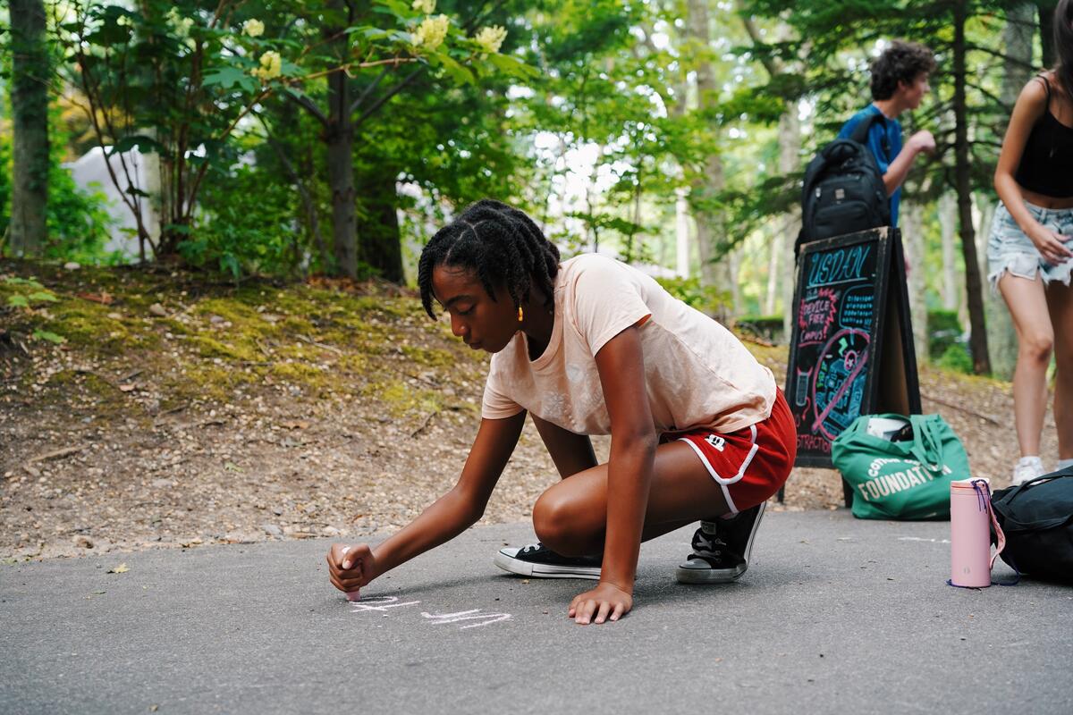 Spreading kindness all around campus with chalk for Camp Kindness Day