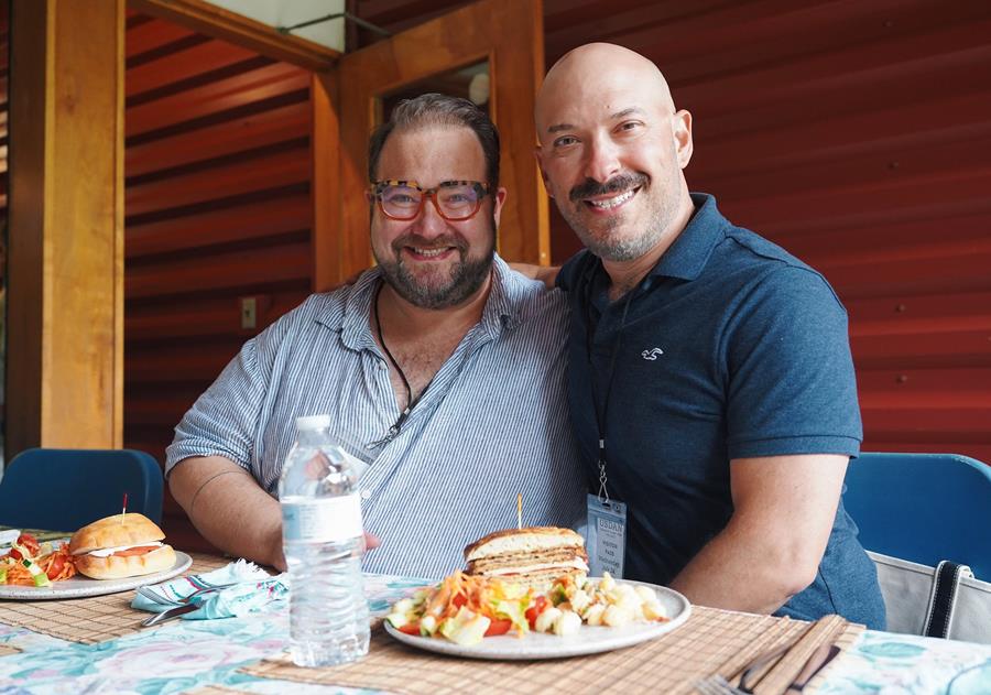 Alumni Award recipient Mat Eisenstein (right) enjoying a moment at the backstage lunch with friend and Festival performer Joshua Lamon.