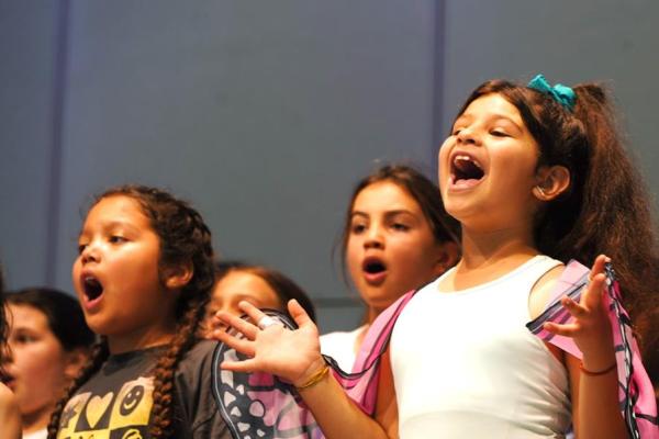 Usdan Summer Camp for the Arts students perform on stage in the McKinley Amphitheater
