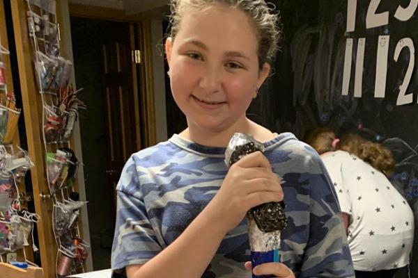 Photo of young girl named Sarah, smiling