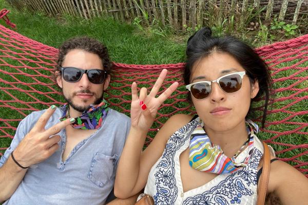 Jem and Lani posing in a hammock