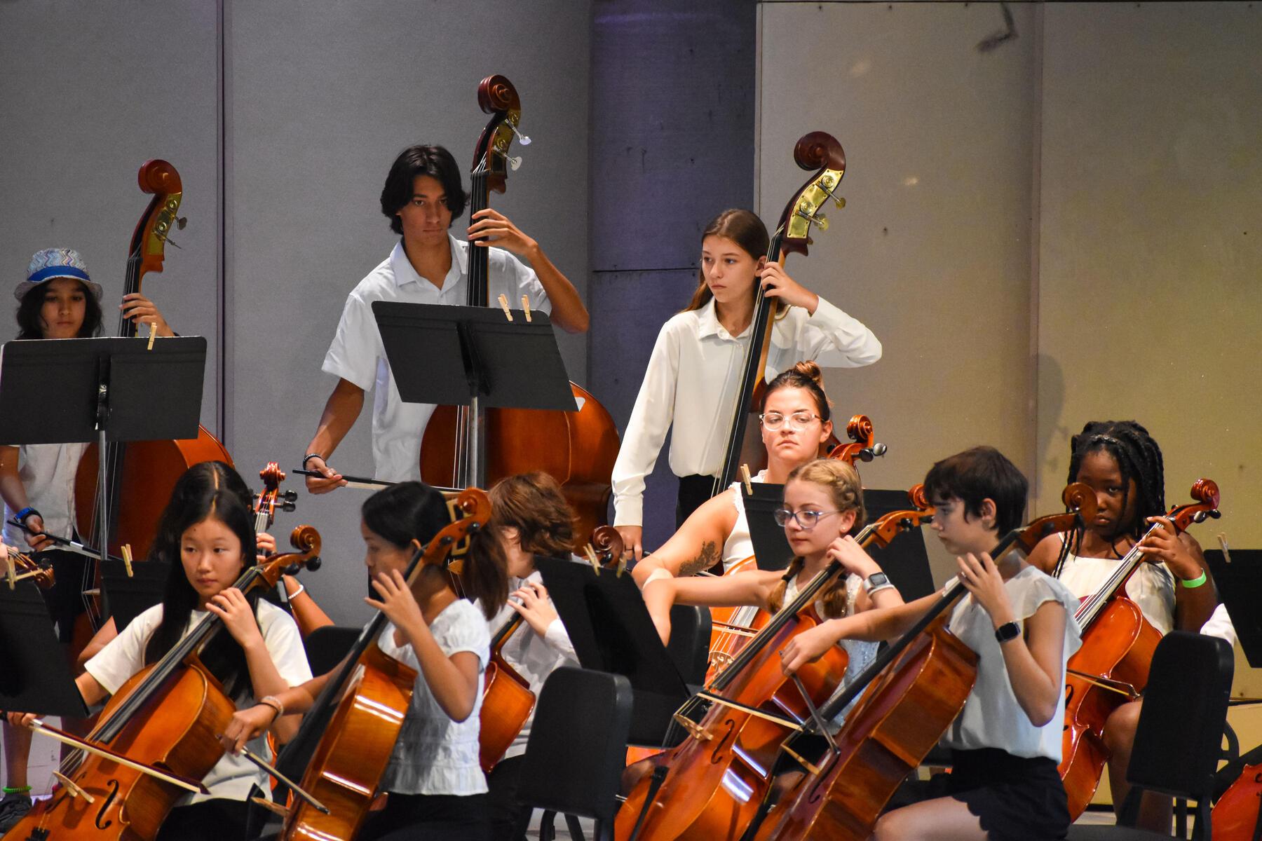Image of middle school students playing in an orchestra