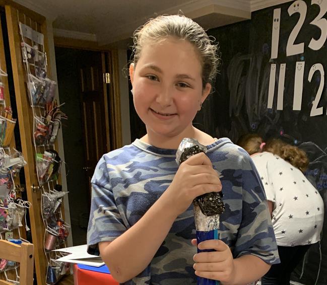 Photo of young girl named Sarah, smiling