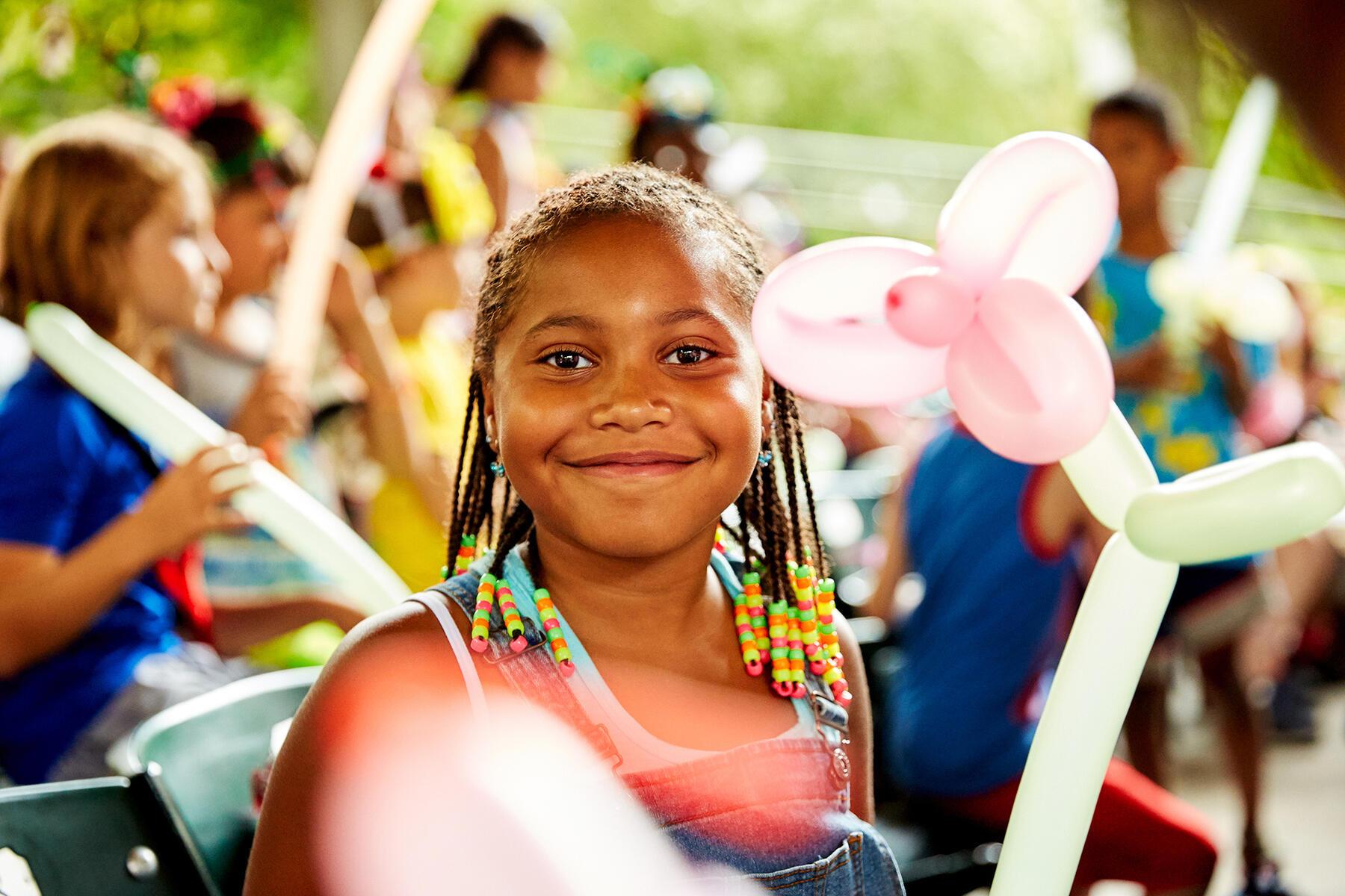Young girl smiling at camera in Amphitheater