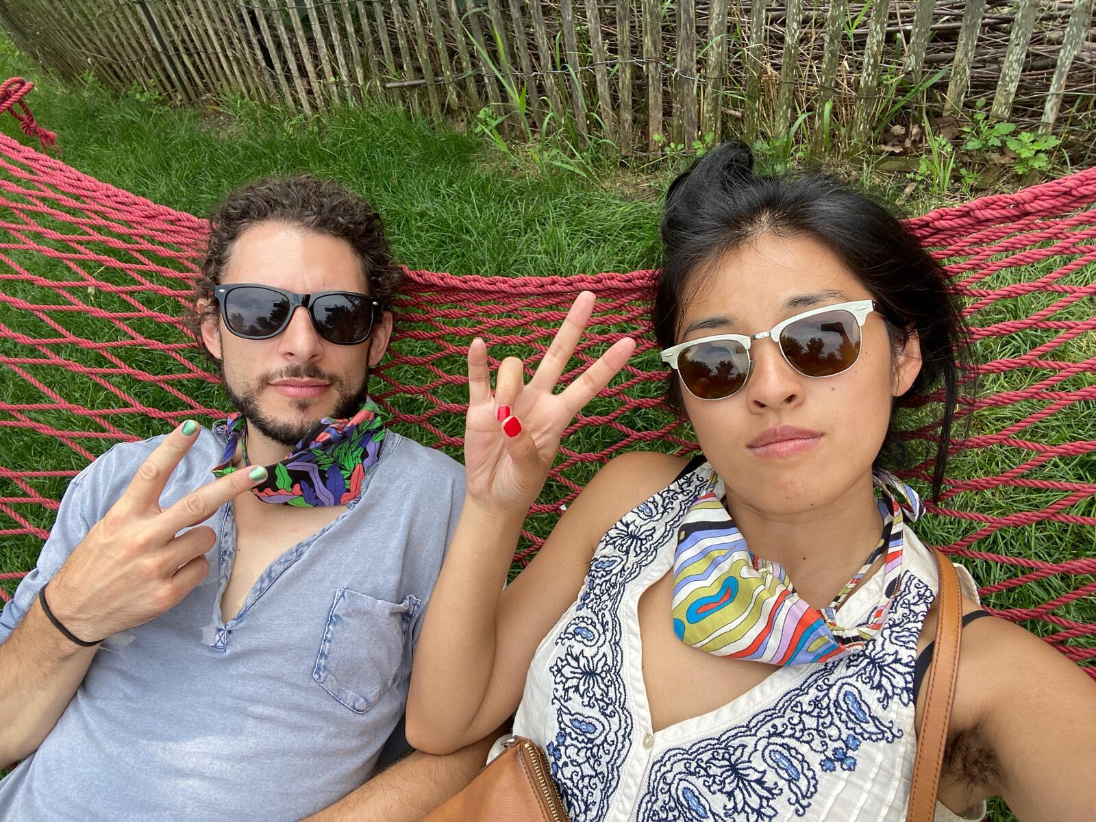 Jem and Lani posing in a hammock